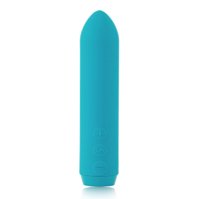 El Vibrador Bala Clásico en color verde azulado es un mini vibrador cilíndrico y elegante con un extremo cónico. Su superficie lisa cuenta con tres botones de control circulares con símbolos de más