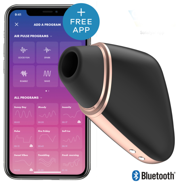 Un Triángulo del Amor negro y de oro rosa junto a un smartphone con su aplicación de control; se muestran los iconos de Bluetooth y de la aplicación gratuita.