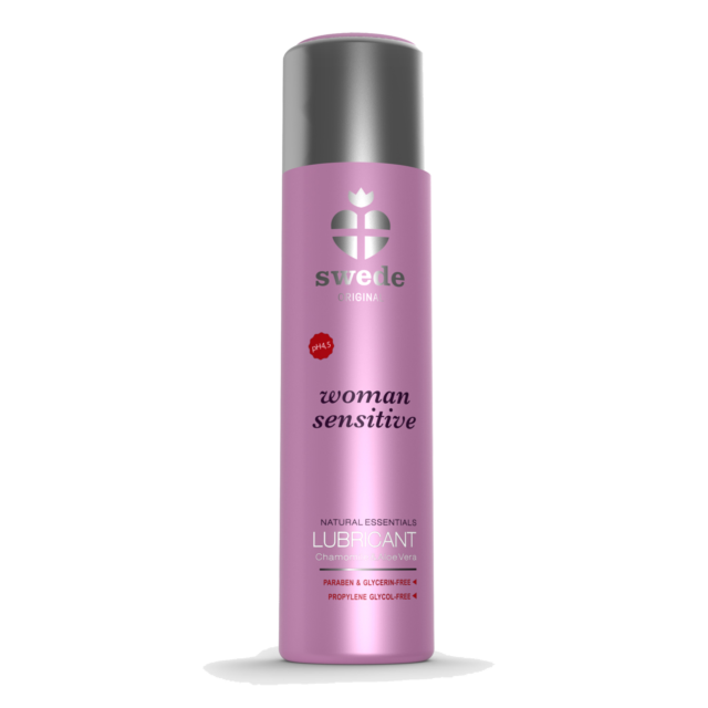 Una botella rosa de lubricante Woman Sensitive, a base de agua con fórmula hidratante para mujeres, ideal para piel sensible; cuenta con una tapa gris y un logotipo de corazón blanco. Sin parabenos ni glicerina.